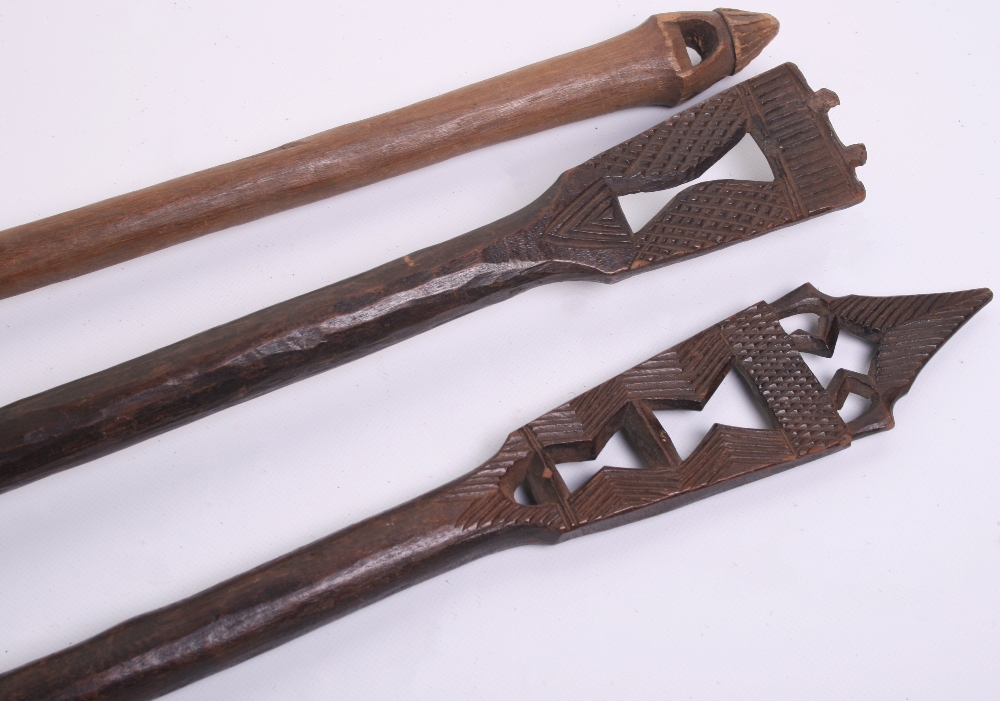 Three Assorted West African Carved Wooden Paddles, maximum 66.5