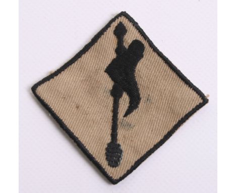 Rare 116th Indian Infantry Brigade Cloth Formation Sign, black Indian battle axe on khaki square with thin black border. Good