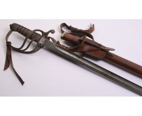 George V Royal Artillery 1821 Pattern Officers Sword complete with its original brown leather field service scabbard. Three b