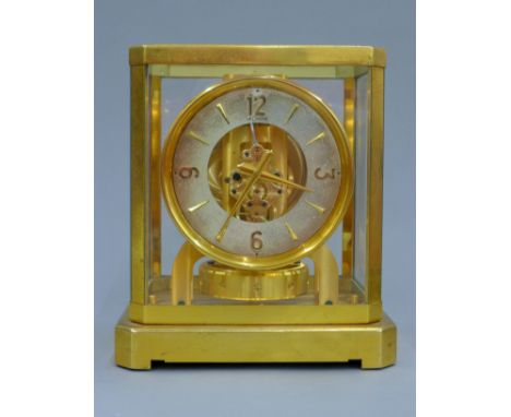 A Le Coultre Atmos clock. 23.5 cm high.