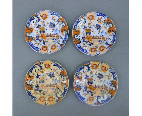 A set of four 19th century child's Ironstone type plates. 10.5 cm diameter.