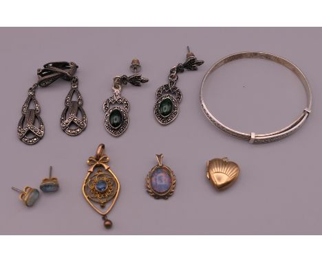 A quantity of antique and later jewellery including marcasite earrings, 9 cm gold back and front love heart locket and opal e