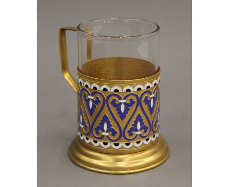 An enamel decorated Russian beaker, boxed. The beaker 11 cm high overall.