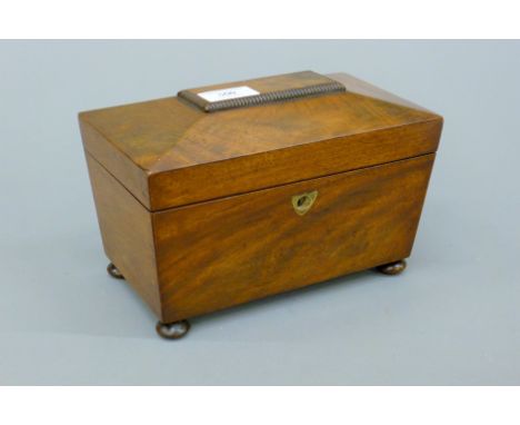A 19th century mahogany tea caddy. 22.5 cm wide.