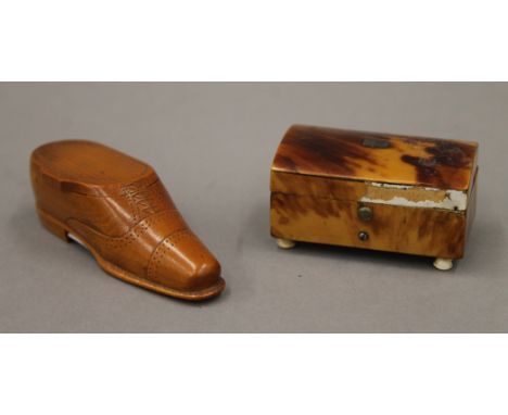 A Victorian tortoiseshell box and a treen snuff shoe. The former 6 cm wide.