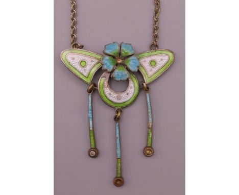 An Art Nouveau chrome plate enamel floral drop pendant necklace. Pendant 4.5 cm high.