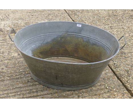 A vintage galvanized wash bowl.