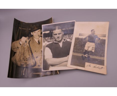A vintage photograph of Colchester United's Player-Manager Ted Fenton, complete with his sack of oysters and black cat mascot