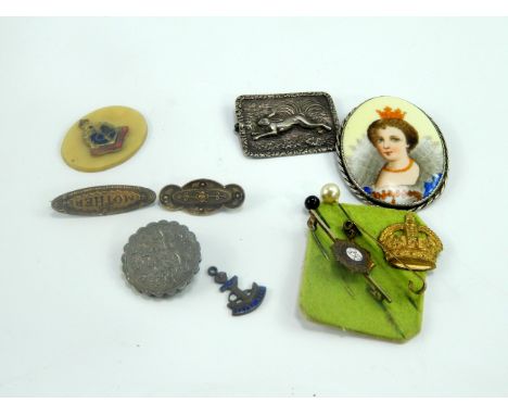 Jewellery, including a Royal Army Service Corps brooch, a Royal Navy charm and brooch plaque, white metal brooch embossed wit