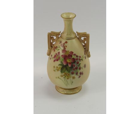 A Royal Worcester ovoid vase, model 1539, hand painted with flowers on a blush and gilt ground, (AF)