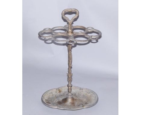 A Victorian style brass stick and umbrella stand, cast to the top with serpents, the base with vines, 66cm high.