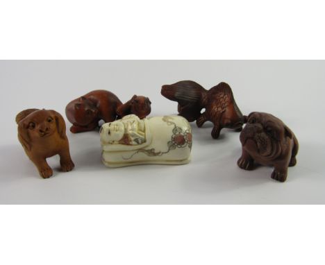 Javanese carved wooden netsuke, comprising a goldfish, rat and cat, Pekingese and a bull dog, and a faux ivory netsuke of a c