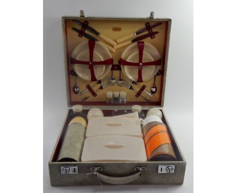 A Sirram cased picnic set, four place settings.
