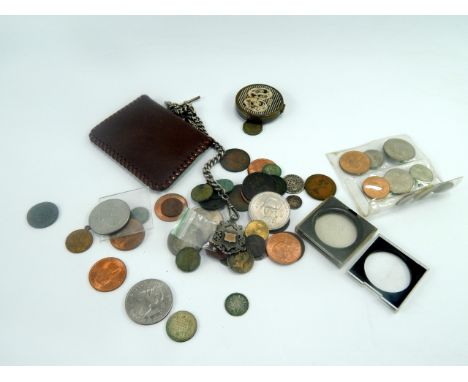 A silver curb link Albert chain and medallion, with T bar as fitted, a quantity of coins including a George V half crown 1933