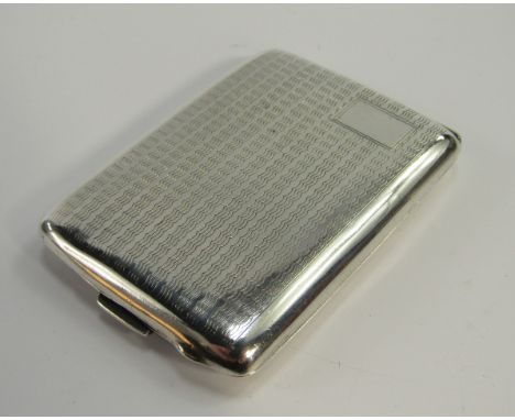 A George V silver match sleeve, containing four Astorias matches, with engine turned decoration, Birmingham 1928, 1.02t oz to