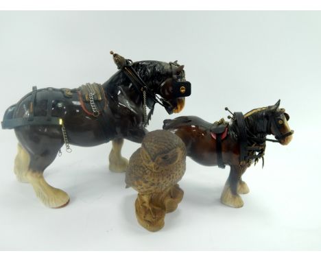 A Beswick pottery cart horse, 28cm high, a Sylvac pottery car horse, 25cm high, and a Poole Pottery owl modelled by B Lindley