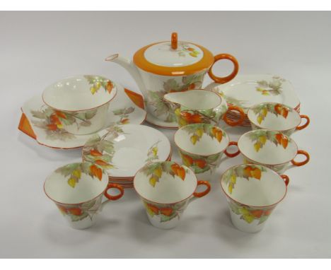 A Shelley porcelain part tea service, decorated in the Cape Gooseberry pattern, printed and painted marks, comprising teapot,