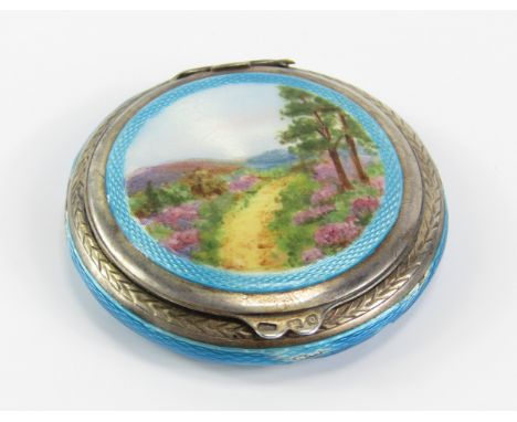 A George V silver and turquoise guilloche enamel compact, the lid painted with a moorland landscape, London 1929, 1.81t oz to