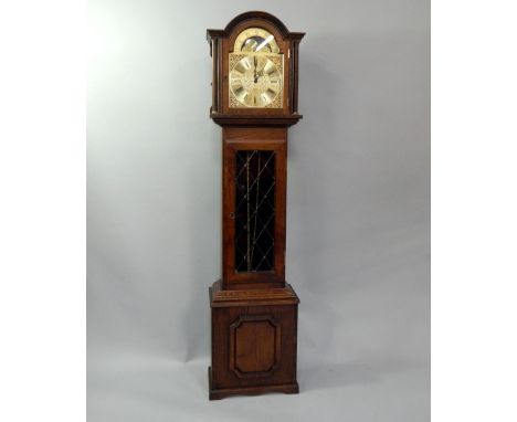 An oak longcase clock, with moon roller to arch, 193cm high