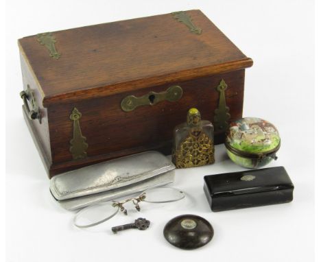 A Victorian brass bound oak box, containing a serpentine pocket compass, circular porcelain box printed with a hunting scene,