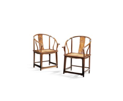 A VERY RARE PAIR OF HUANGHUALI HORSESHOE-BACK ARMCHAIRS, QUANYI17th/18th centuryBoth chairs with the sweeping crest rail term