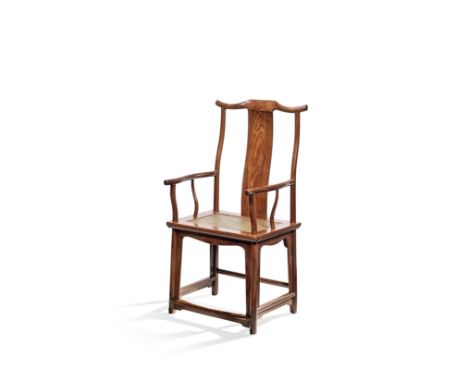 A VERY FINE AND RARE HUANGHUALI YOKEBACK ARMCHAIR, GUANMAOYI17th centuryWith a well-carved protruding crestrail supported on 