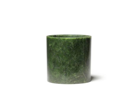 A SPINACH-GREEN JADE BRUSHPOT, BITONGMid Qing DynastyOf cylindrical form inset with a circular base, the lustrous stone of ri