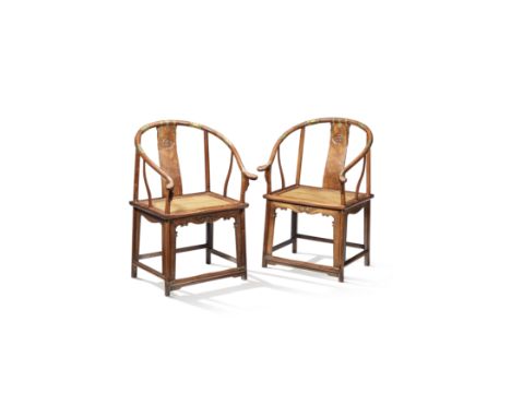 A VERY FINE PAIR OF HUANGHUALI HORSESHOE-BACK ARMCHAIRS, QUANYI17th centuryEach elegantly modelled with a curving toprail slo