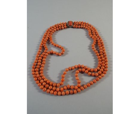 A Vintage Three String Coral Necklace with Coral Mounted Clasp. 