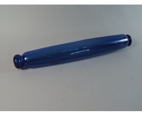 A Victorian Blue Glass Rolling Pin.