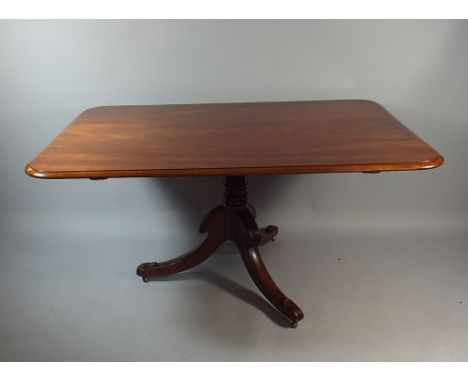 A Victorian Mahogany Snap Top Rectangular Breakfast Table on Turned Support with Tripod Feet. 150 x 99 Cm.