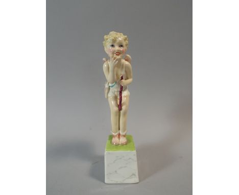 A Royal Worcester Figure "Hit" Modelled by Gwendoline Parnell. Puce Back Stamp, Number 3105.