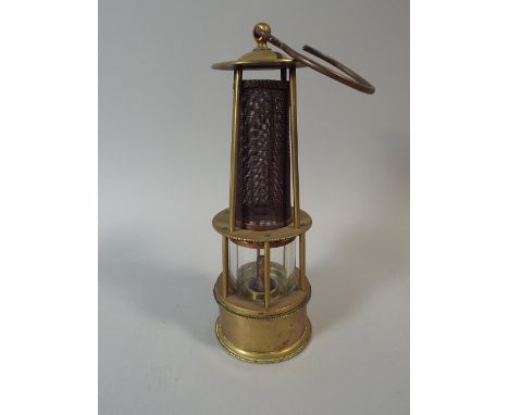 A Small Brass Miners Safety Lamp, 23 Cm High. 