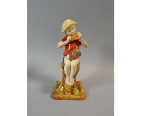 A Royal Worcester Figure "Peter Pan" Modelled by F.Gertner. Number 3011, Puce Back Stamp. 