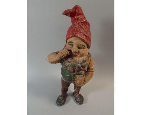 A Vintage Painted Plaster Model of A Gnome Taking Snuff, 38 Cm High. 