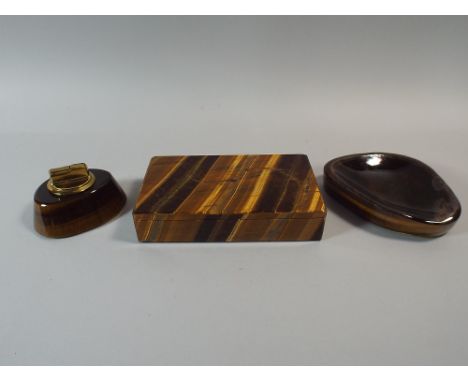 A Collection of Tigers Eye Items to Include Rectangular Box, Table Lighter and Ashtray. 