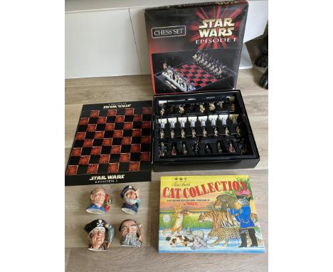 Assorted items to include Four Royal Doulton Toby Jugs, Star Wars Chess Set and Wade Cat Collection Crackers by Tom Smith
Gre