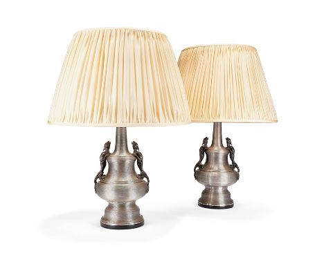 A pair of late 19th century French steel wire work lamp bases
With dragon handles, converted from moderator oil lamps, circa 