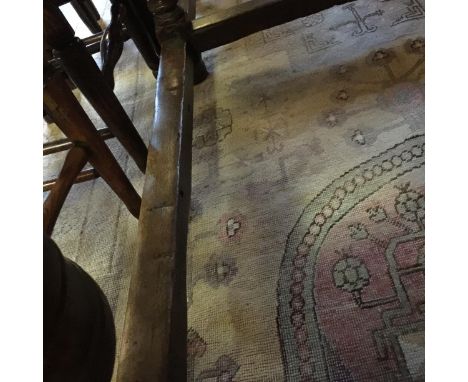 A late 18th/early 19th century Dutch oak carved six-leg table
The three-plank top with end cleats, above friezes with chamfer