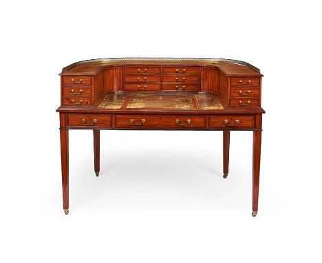 A good mid Victorian satinwood and mahogany crossbanded Carlton House desk attributed to GillowsInlaid with ebonised lines, t