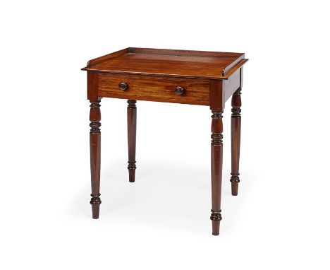 A George IV mahogany side tableThe rectangular top with three-quarter gallery above a frieze drawer on ring turned tapering l