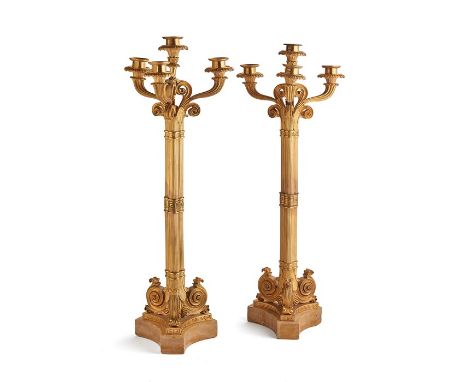 A pair of Louis Philippe ormolu four-light candelabra attributed to Pierre-Philippe Thomire, circa 1840
With scrolling arms a