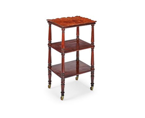 A George IV gonçalo alves three-tier what-not
The rectangular top with lobed moulded edge above two further tiers, all joined