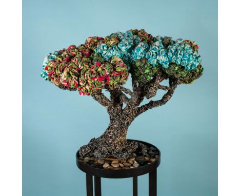 Bonsai III is an outstanding original mixed media polychrome sculpture by Cuban social commentary artists Alain Guerra and Ne