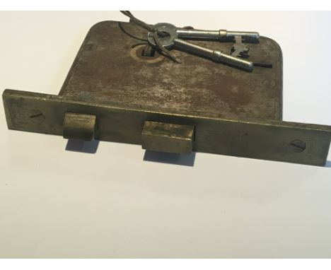A Comyn Ching Co of London upright Mortice Sash lock with two sideward Keys.