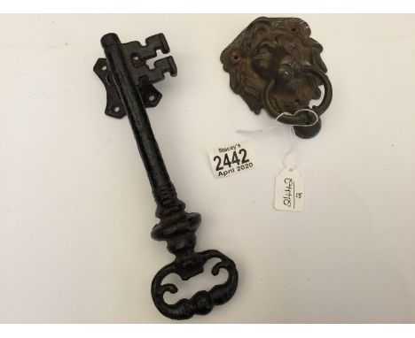 A Large Victorian Key door Knocker with a brass lion head door Knocker