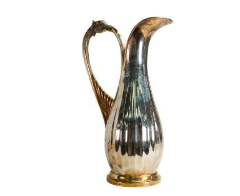 A sterling silver wine decanter with illegible hallmarks and 925 silver mark. This gorgeous pitcher is decorated with finely 