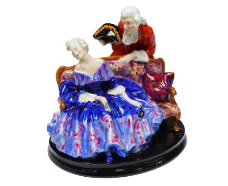 This early Royal Doulton figurine titled Tete a Tete (HN799) portrays a romantic exchange between a refined gentleman and an 