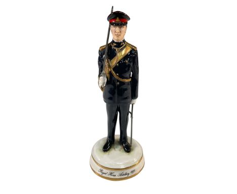 This meticulously crafted Michael Sutty porcelain figurine depicts a Royal Horse Artillery Officer in No. 1 Dress Ceremonial 