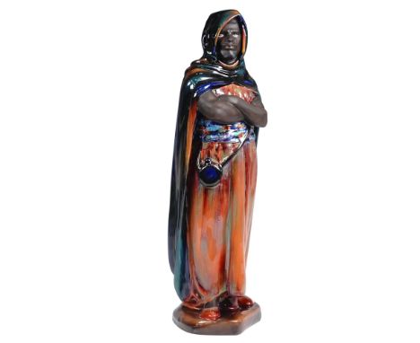 Royal Doulton bone china figurine titled The Moor, model HN2028, featuring a regal male figure in a vivid, multicolored cloak